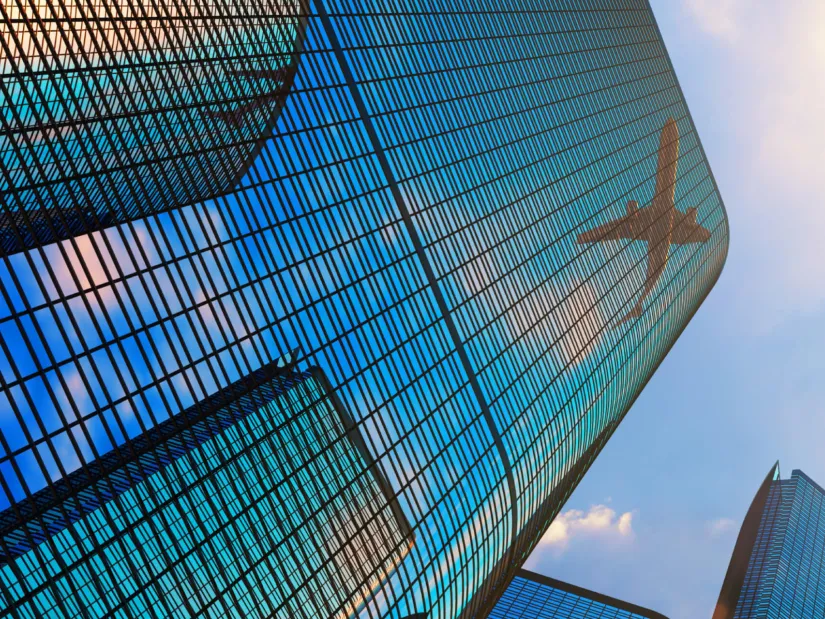 glass-building-aeroplane-shadow-banner